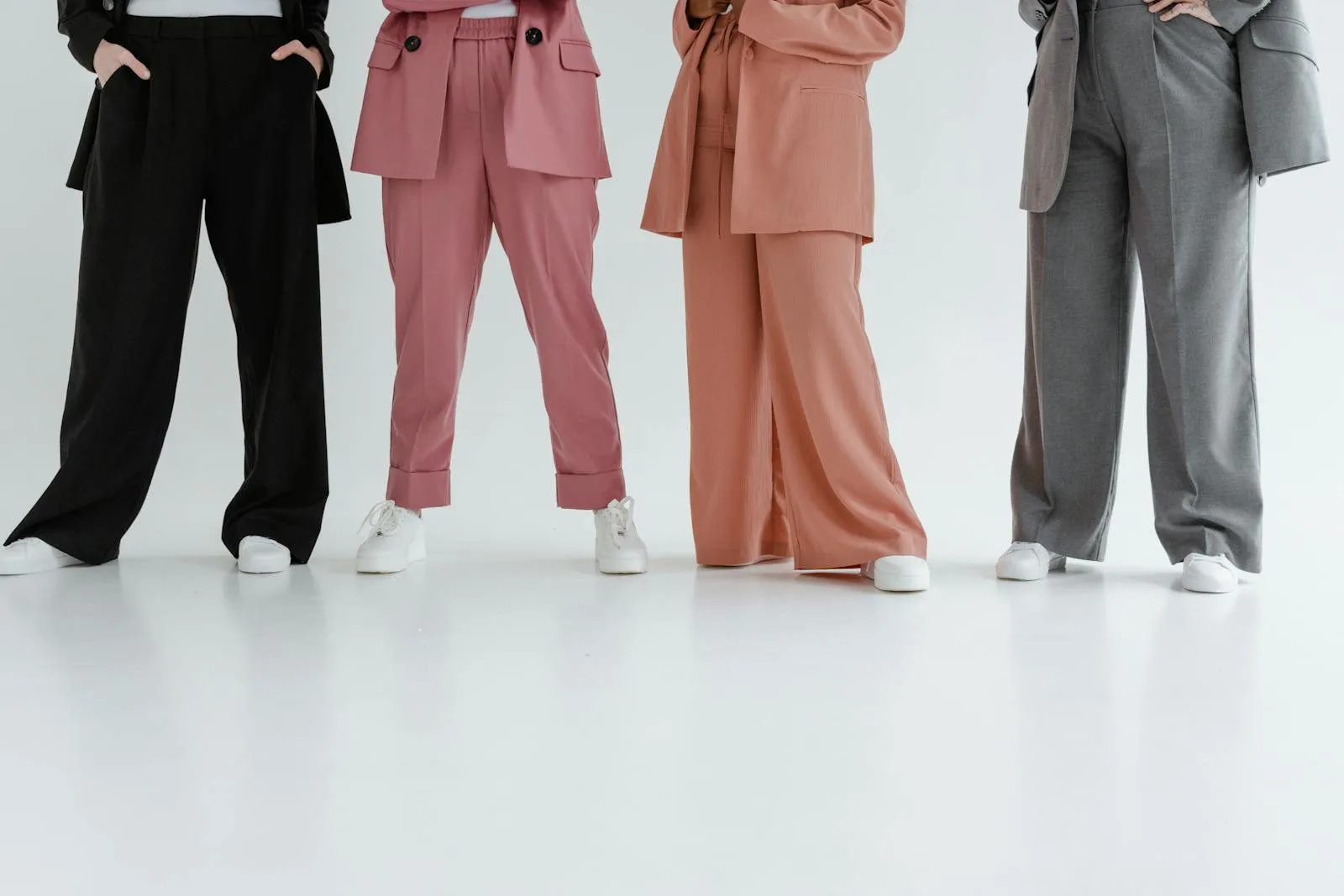 Fashion professionals in stylish suits, EU Circular Economy Act compliance for fashion brands